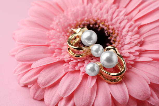 Pearls in exotic green leaves, luxury jewellery closeup