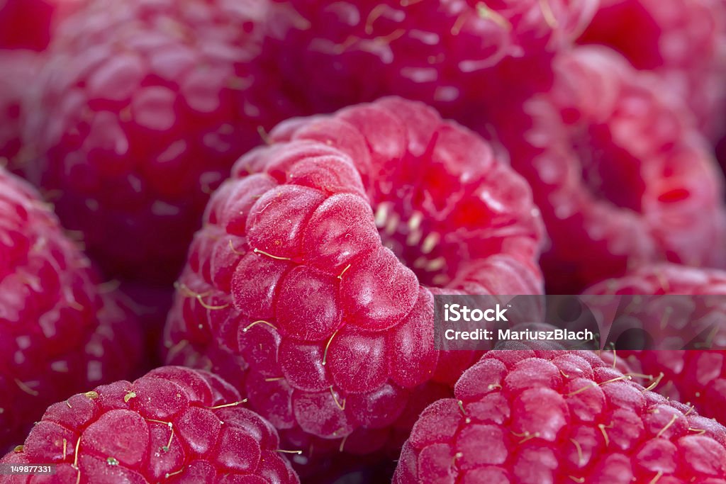 red rasperries red rasperries macro shot Berry Fruit Stock Photo