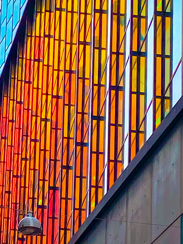 Colored building facade with apartment windows