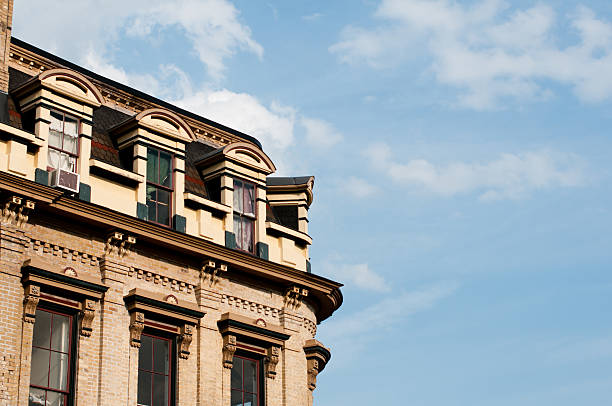 istock building architecture clouds sky windows brick roof drapes air conditioner 149877765