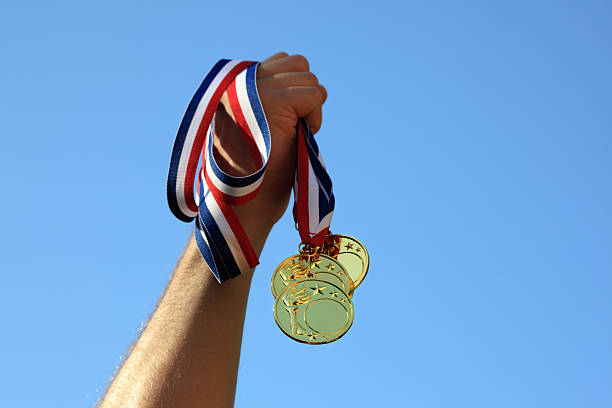 ganador de medalla de oro - acontecimiento deportivo internacional fotografías e imágenes de stock