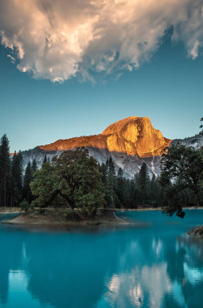 istock wonderful view of a lake between the mountains ( vertical ) 1498783348