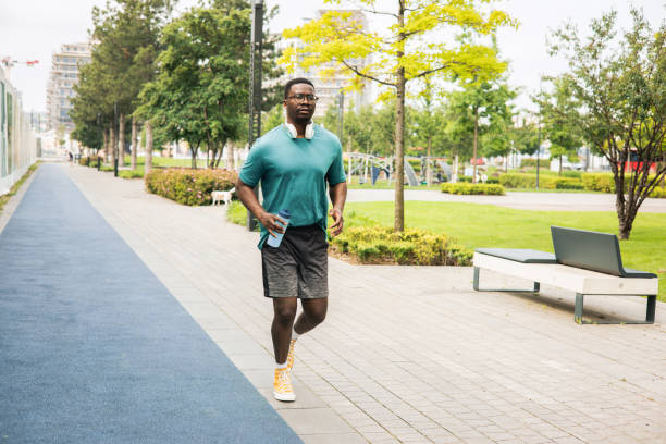 istock Young man is exercising outdoors 1498783835