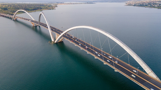 The Juscelino Kubitschek Bridge, also known as JK Bridge or Third Bridge, is located in Brasília, connecting Lago Sul, Paranoá and São Sebastião to the central part of Brasília, through the Monumental.\nBRASILIA, BRAZIL - SETEMBRO 27, 2021