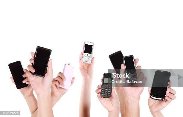 Mitarbeiter Die Mobile Im On The Netxxl Stockfoto und mehr Bilder von Viele gehobene Hände - Viele gehobene Hände, Telefon, Halten