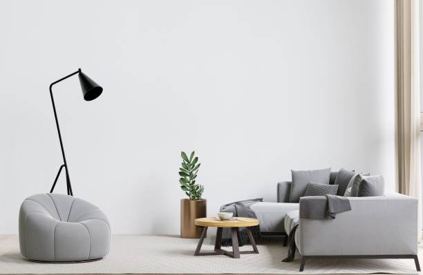 istock Contemporary living room with a grey sofa, coffee table, lamp, and a bean bag. 3d rendering. 1498793435