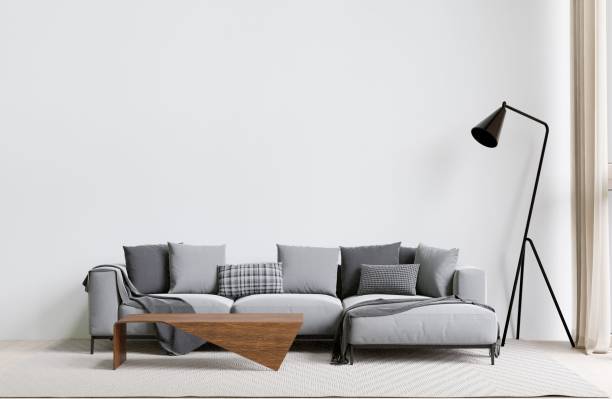 istock Contemporary living room with a grey sofa, lamp, and coffee table. 3d rendering. 1498793439