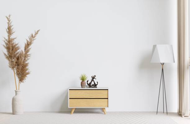 istock Small drawer with a lamp and decorative plants against a white wall. 3d rendering. 1498793453
