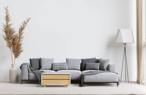 istock Contemporary living room with a grey sofa, lamp, and decorative plants. 3d rendering. 1498793456