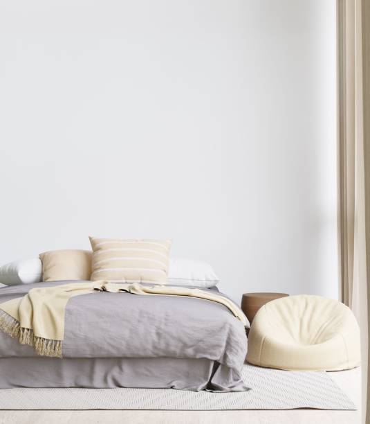 istock Contemporary bedroom with a soft bed, and bean bag. 3d rendering. 1498793457