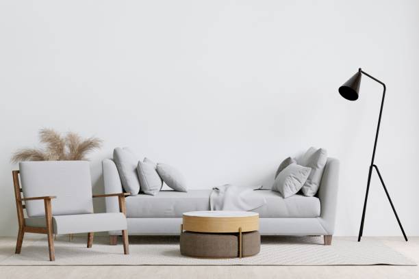 istock Contemporary living room with a grey sofa, armchair, and coffee table. 3d rendering. 1498793521