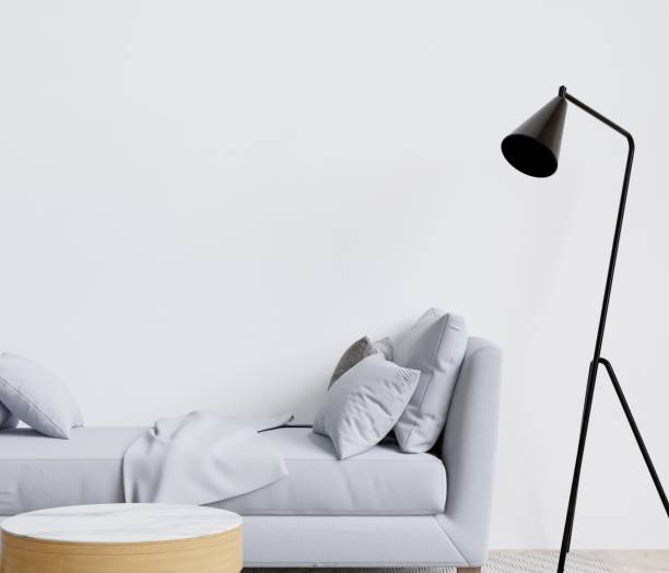 istock Contemporary living room with a grey sofa, lamp, and coffee table. 3d rendering. 1498793527