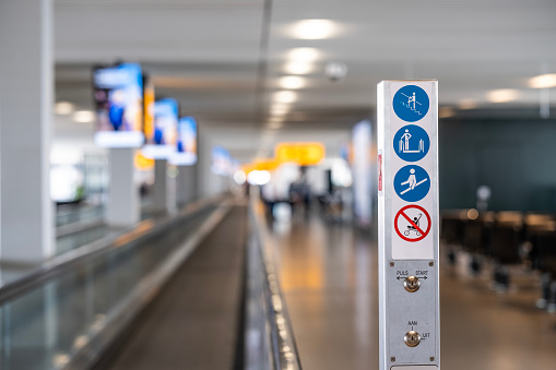 Warnings Signs of Moving Walkway in Amsterdam Schiphol Airport.