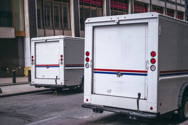 istock Delivery Vans in The Street. 1498801804