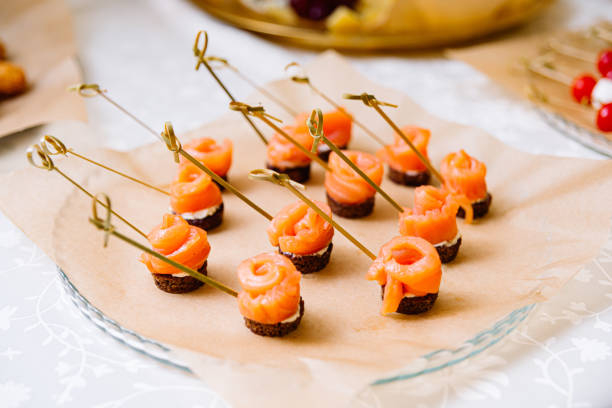 istock Smoked Salmon Canapes with Cream Cheese on Rye Bread for Catering 1498805406