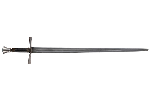 Photograph of a pair of matched Swords - Great for a Pirate or Cavalry themed image. Lower camera angle looking past the handle, up the blade.