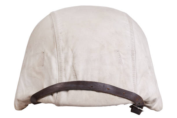 istock Army helmet with white winter camouflage cover 1498812761