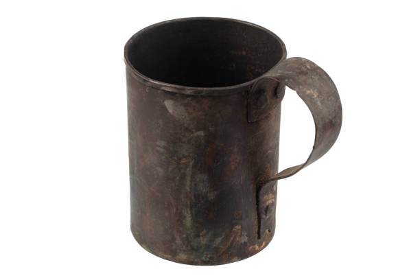 istock Antique army vintage brass mug isolated on a white 1498812835