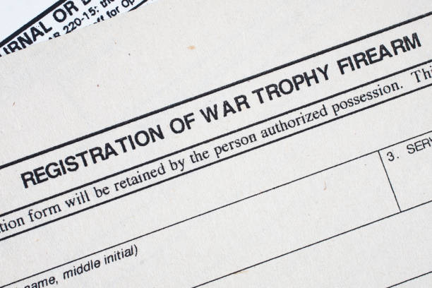 istock Registration of war trophy firearm. US Army old paper background. 1498812862
