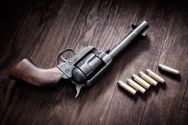 istock Old western revolver with cartridges 1498813025