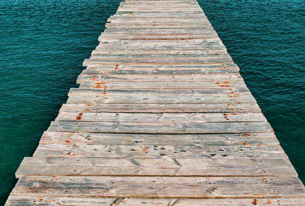 Wooden pier floor Wooden pier floor . Footpath over the sea parallel port stock pictures, royalty-free photos & images