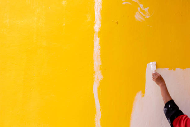 istock Grunge of yellow wall background texture. 1498824137