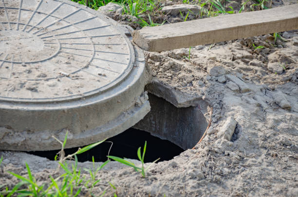 istock The hatch on the ground is open, the hole in the ground 1498825218