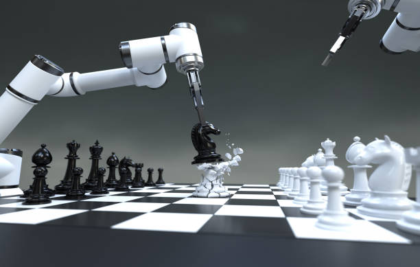 istock Robot arm playing chess, business strategy concept. 1498834512