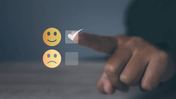 istock Man hand choosing happy smile face positive mindset selection for feedback review satisfaction service. 1498837324