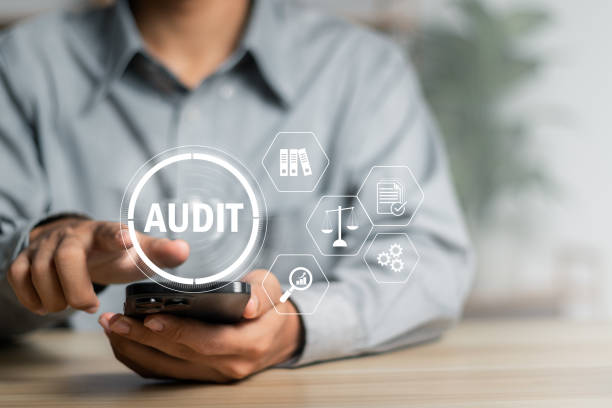 istock Auditing and evaluating corporate financial statements, Audit business concept. 1498838049