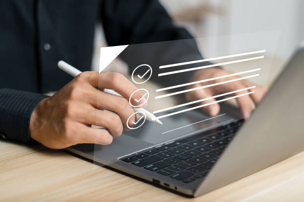istock Electronic signature concept. Businessman signing electronic documents on virtual interface. 1498838086