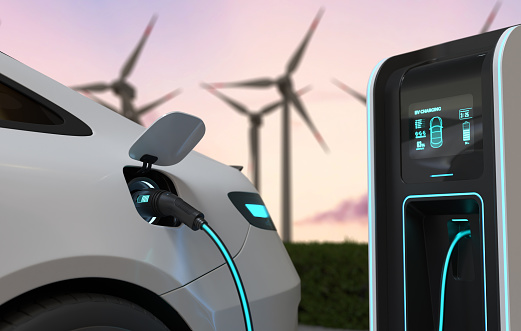 Electric cars Charging at the charging station and with a Wind turbine background, Electric power is an alternative fuel. 3D illustration