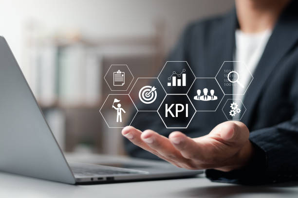 istock Businessman with Key performance Indicator (KPI) icon using business Intelligence (BI) metrics to measure achievement versus planned target. 1498844044