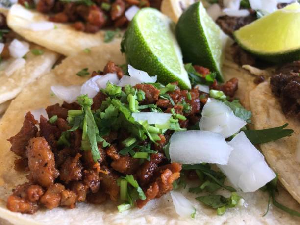 istock Taco al pastor, onion, lime and cilantro. 1498844060