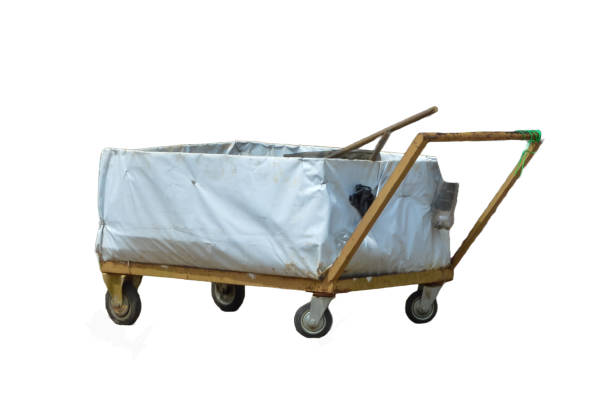 istock Old wooden wheelbarrow isolated on a white background. 1498845690