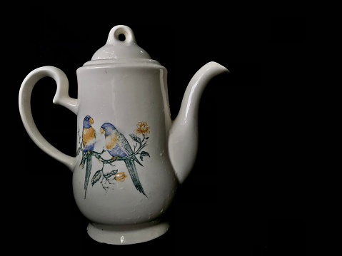 Zoom out teapot with black background