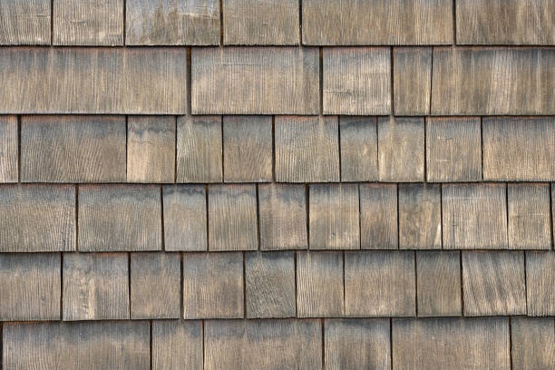 Wall made of wooden shingles stock photo