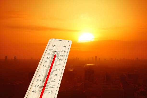 A thermometer and heat in the city stock photo