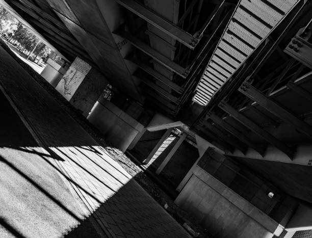 istock Shadows and Downtown Area Bridge in Astana City Black and White Version 1498855934