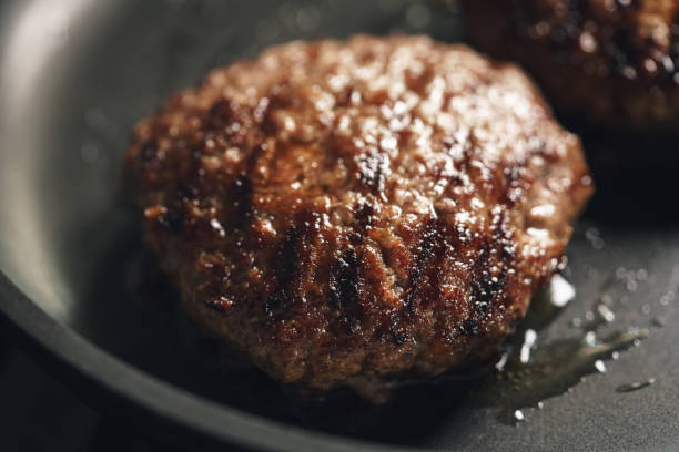 istock beef cutlets on frying pan closeup 1498855991