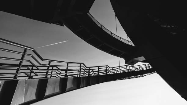 istock Black and White Unique Perspective on Bridge Structure combined with lines 1498858709