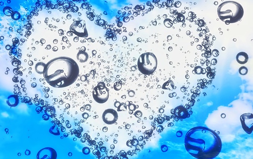 3d illustration of heart shaped cloud and splashing water drops in love concept