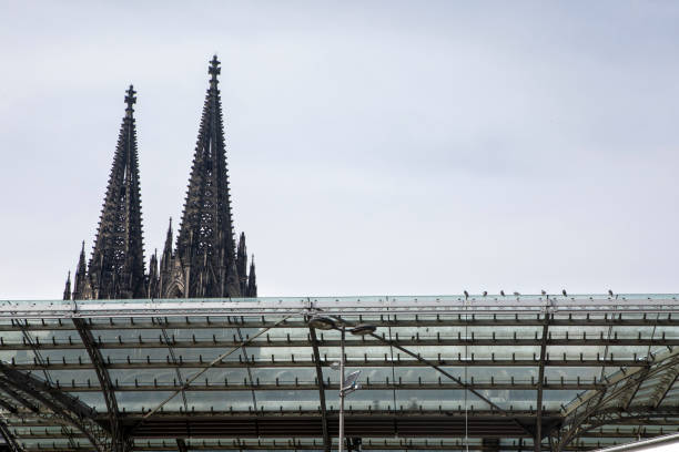 Old cathedral spires contrasting with modern architecture