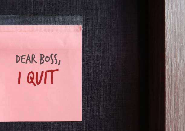 istock Pink note on copy space wall with text DEAR BOSS I QUIT, concept of decision making to quit job, resign from paid work , give up being full time employee and leave workplace 1498866214