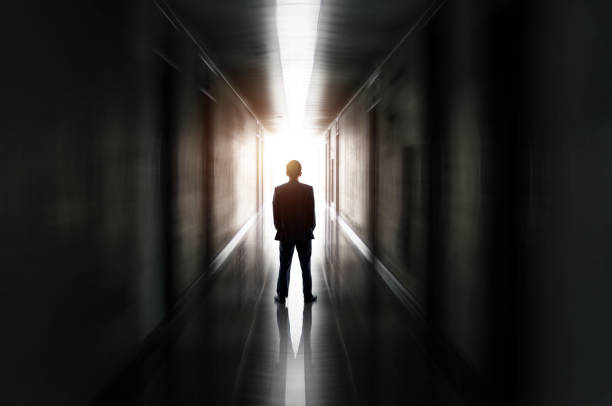 Businessman standing in the tunnel