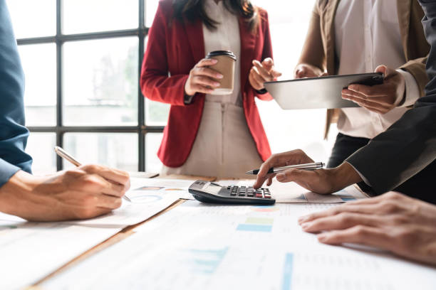 istock Business team collaboration discussing working analyzing with financial and marketing growth report graph, presentation and brainstorming to strategy planning making profit 1498877348