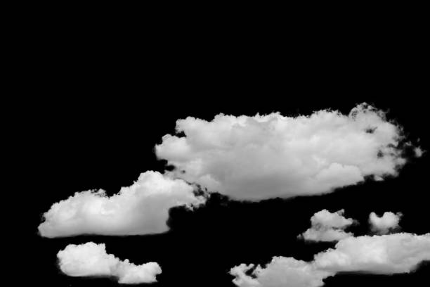 istock white fluffy clouds standing out against a black background and a blue sky 1498877364