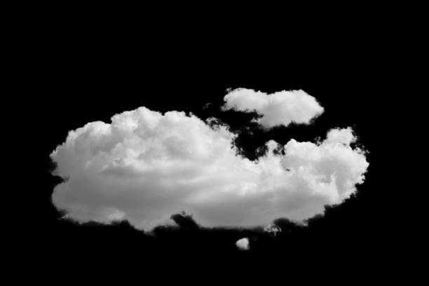 istock white fluffy clouds standing out against a black background and a blue sky 1498877378