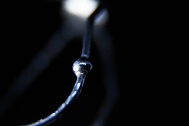 macro image of part of a dough hook for an electric whisk
