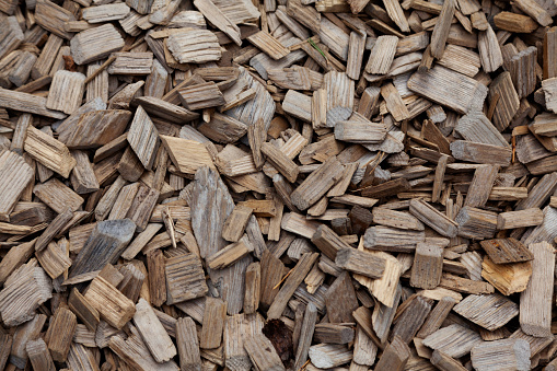 wood chips and bark lying on the ground